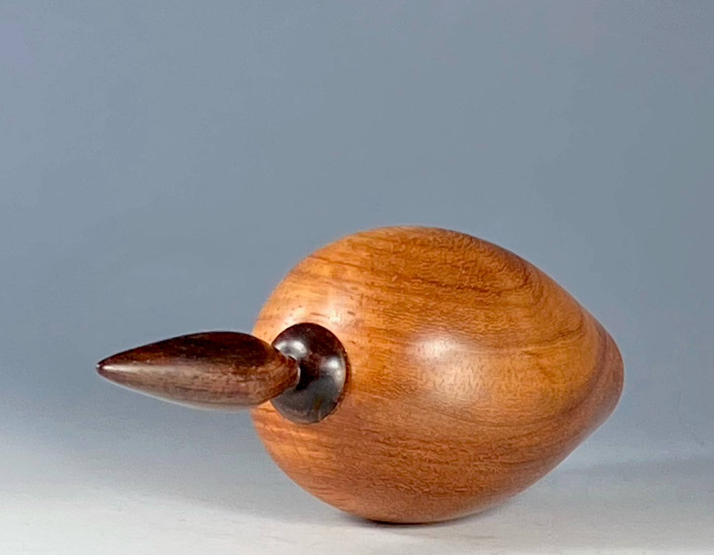 VESSEL TURNED FROM BOLIVIAN ROSEWOOD, WITH COCOBOLO FINIAL