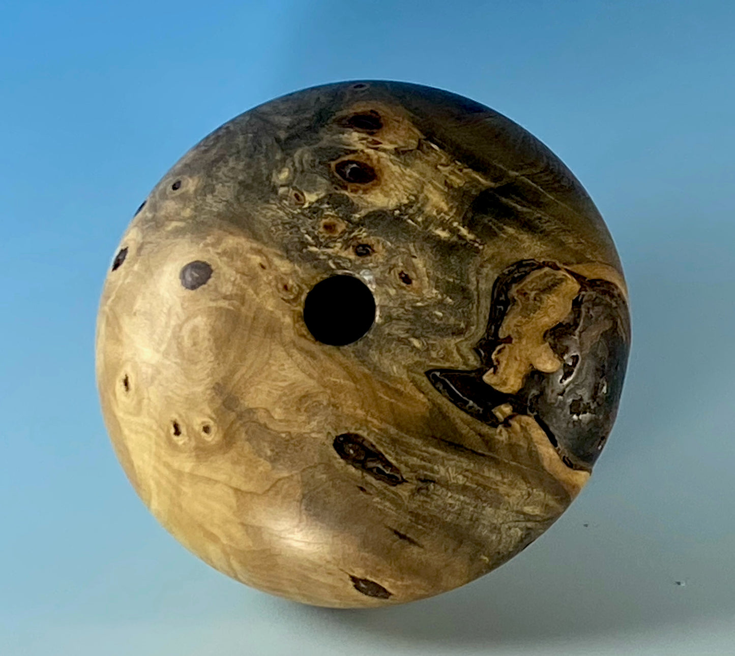 HOLLOW FORM TURNED FROM BUCKEYE BURL