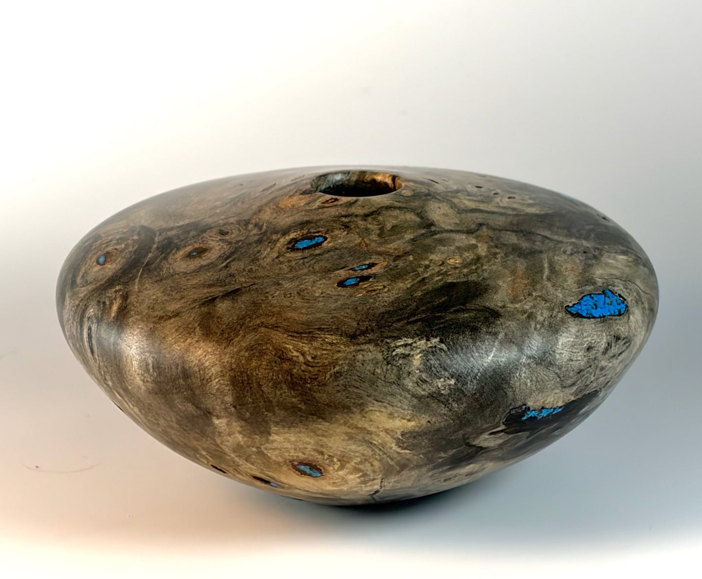 HOLLOW FORM TURNED FROM BUCKEYE BURL