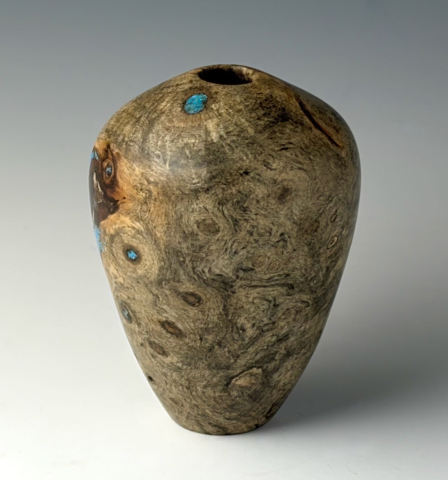 HOLLOW VASE FORM TURNED FROM BUCKEYE BURL