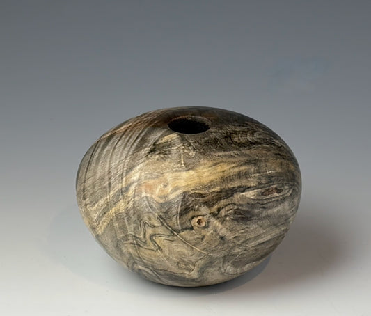 HOLLOW FORM TURNED FROM BUCKEYE BURL