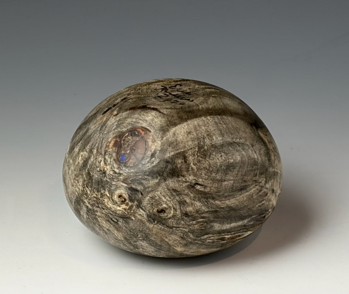 HOLLOW FORM TURNED FROM BUCKEYE BURL