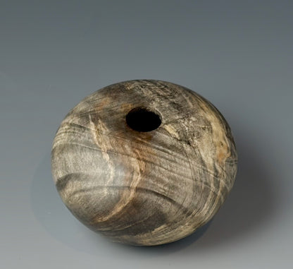 HOLLOW FORM TURNED FROM BUCKEYE BURL