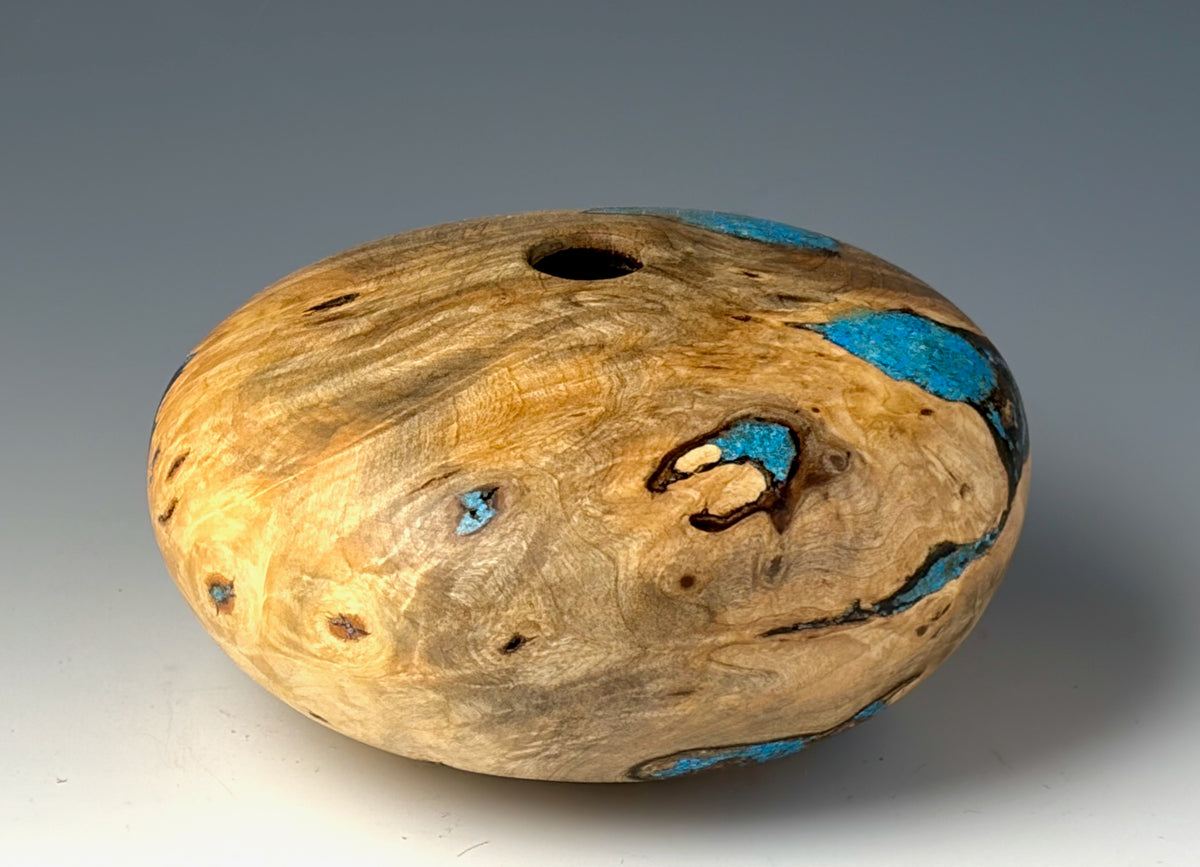 HOLLOW FORM TURNED FROM BUCKEYE BURL, WITH TURQUOISE INLAY