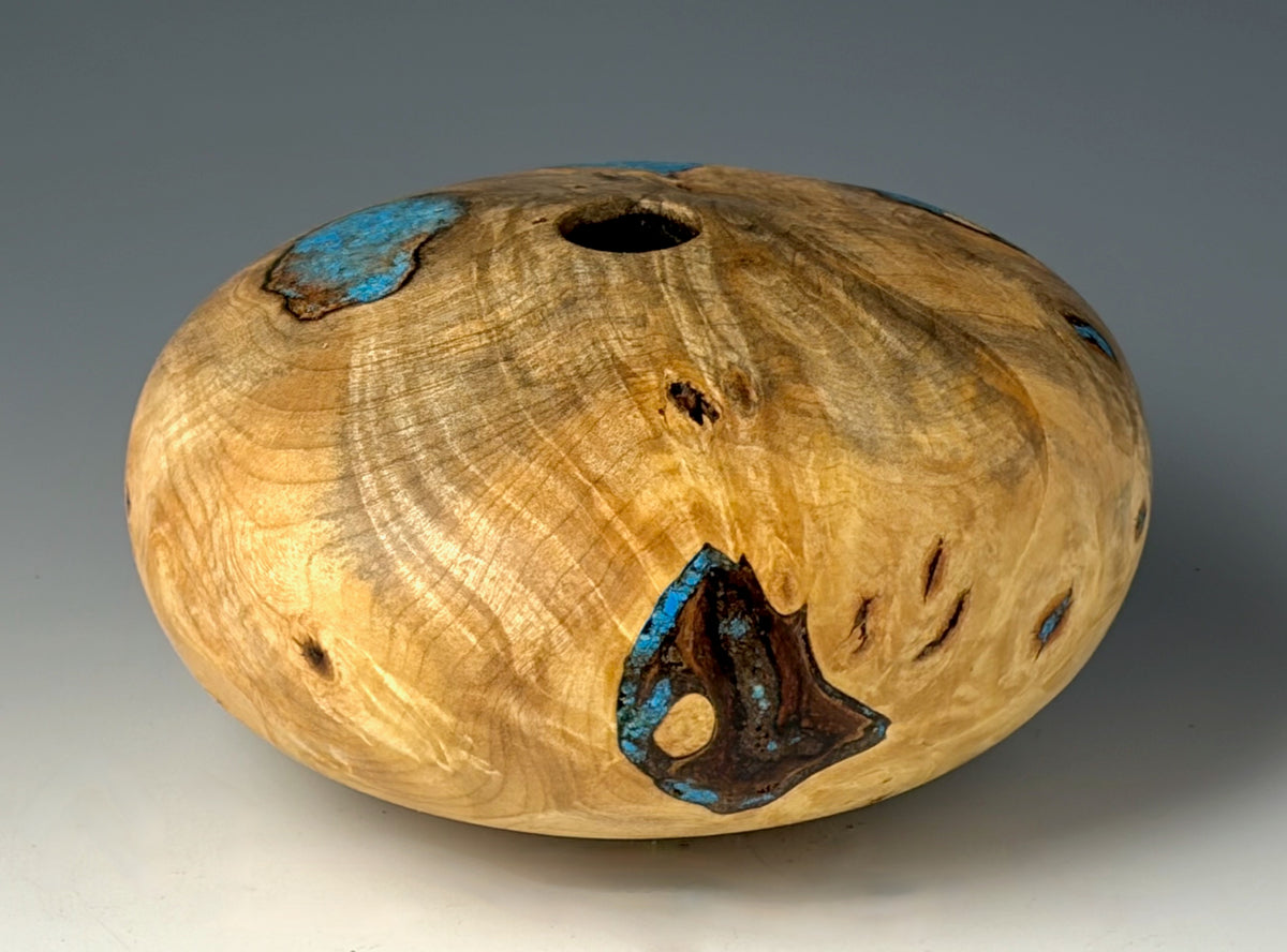 HOLLOW FORM TURNED FROM BUCKEYE BURL, WITH TURQUOISE INLAY