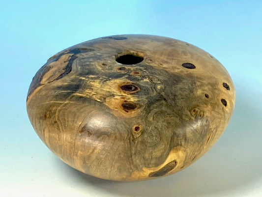 HOLLOW FORM TURNED FROM BUCKEYE BURL