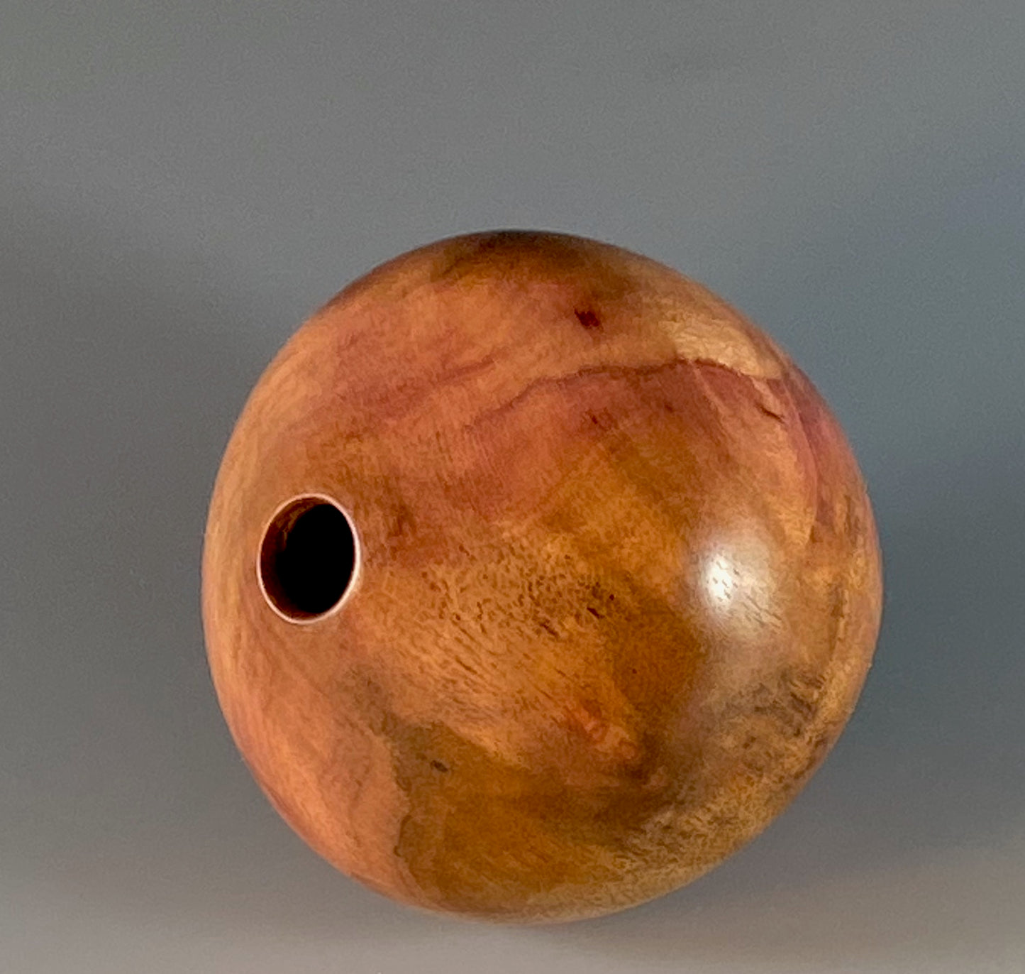 HOLLOW FORM TURNED FROM CAMPHOR BURL