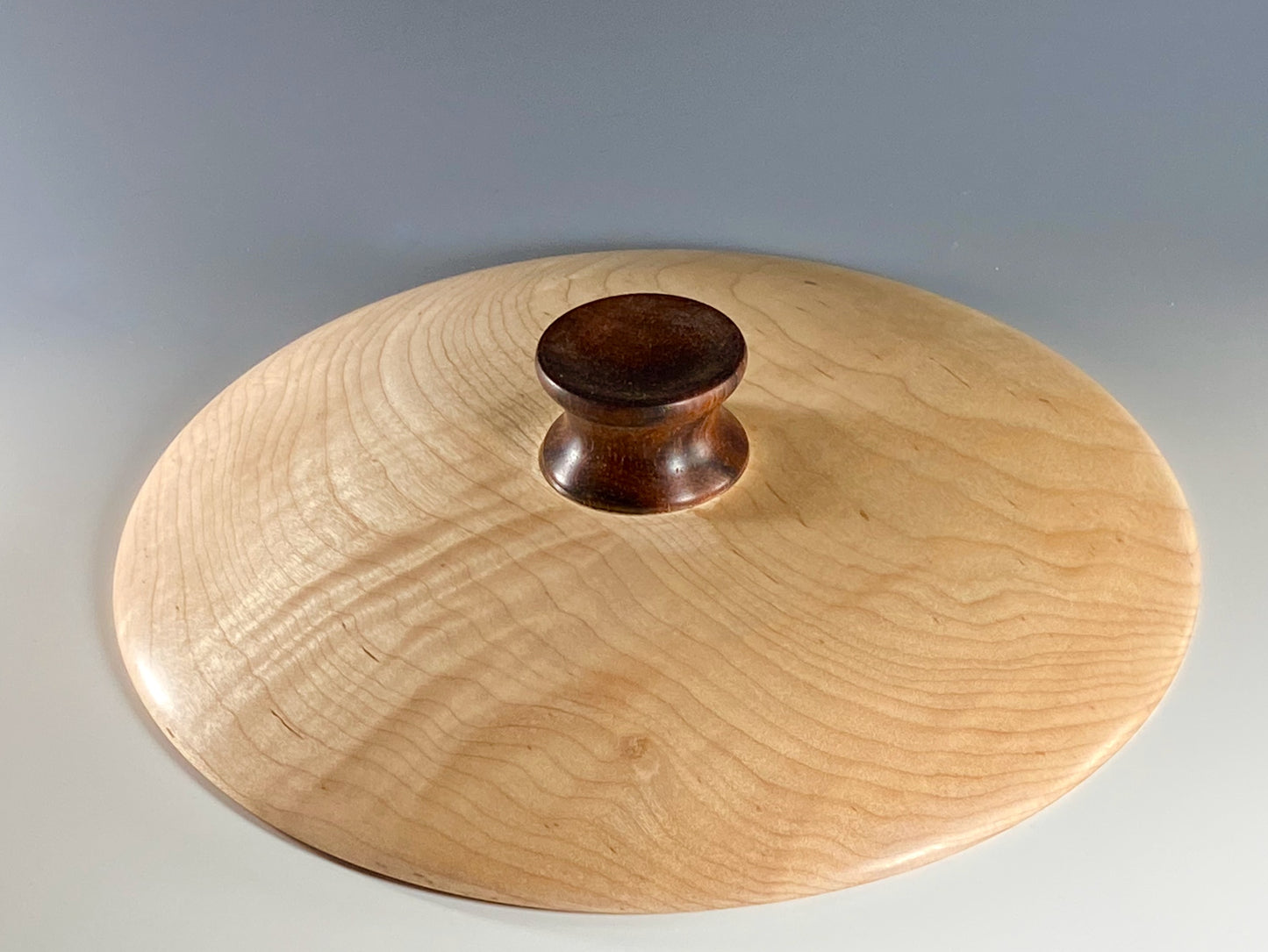 FIGURED SIVLER MAPLE DISPLAY TURNING WITH COCOBOLO ROSEWOOD FOOT