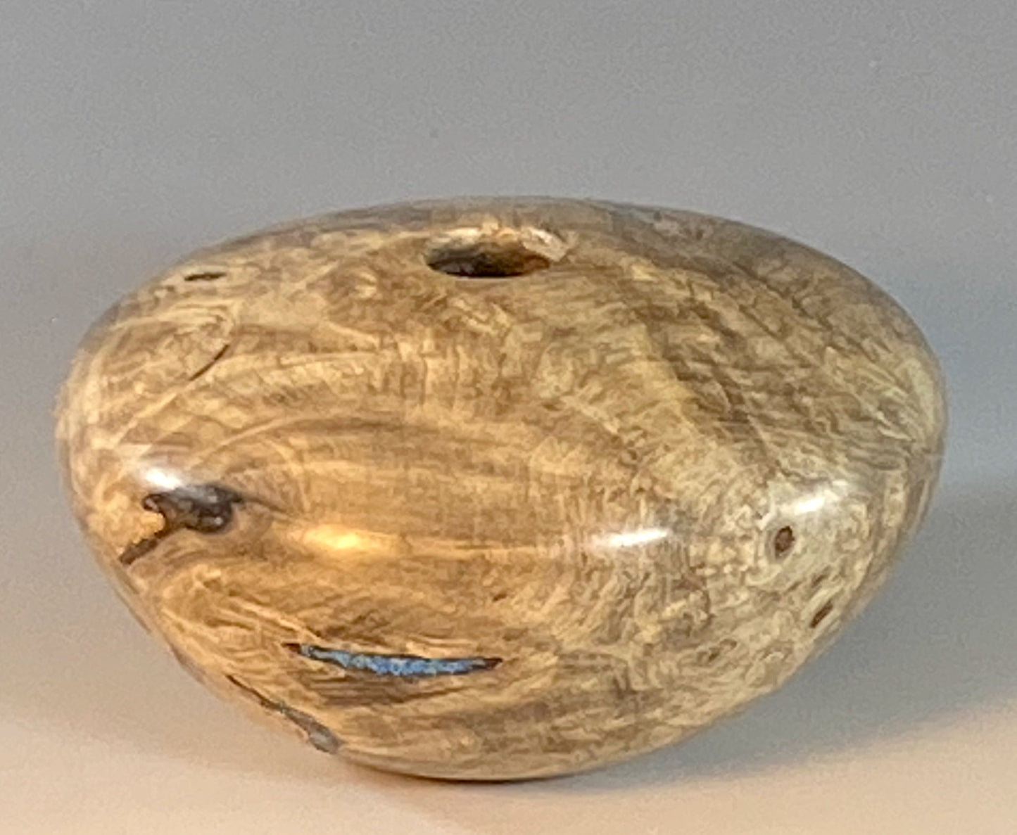 HOLLOW FORM TURNED FROM BUCKEYE BURL