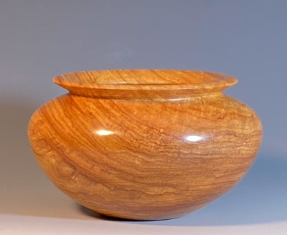 ENCLOSED FORM TURNED FROM CANARYWOOD