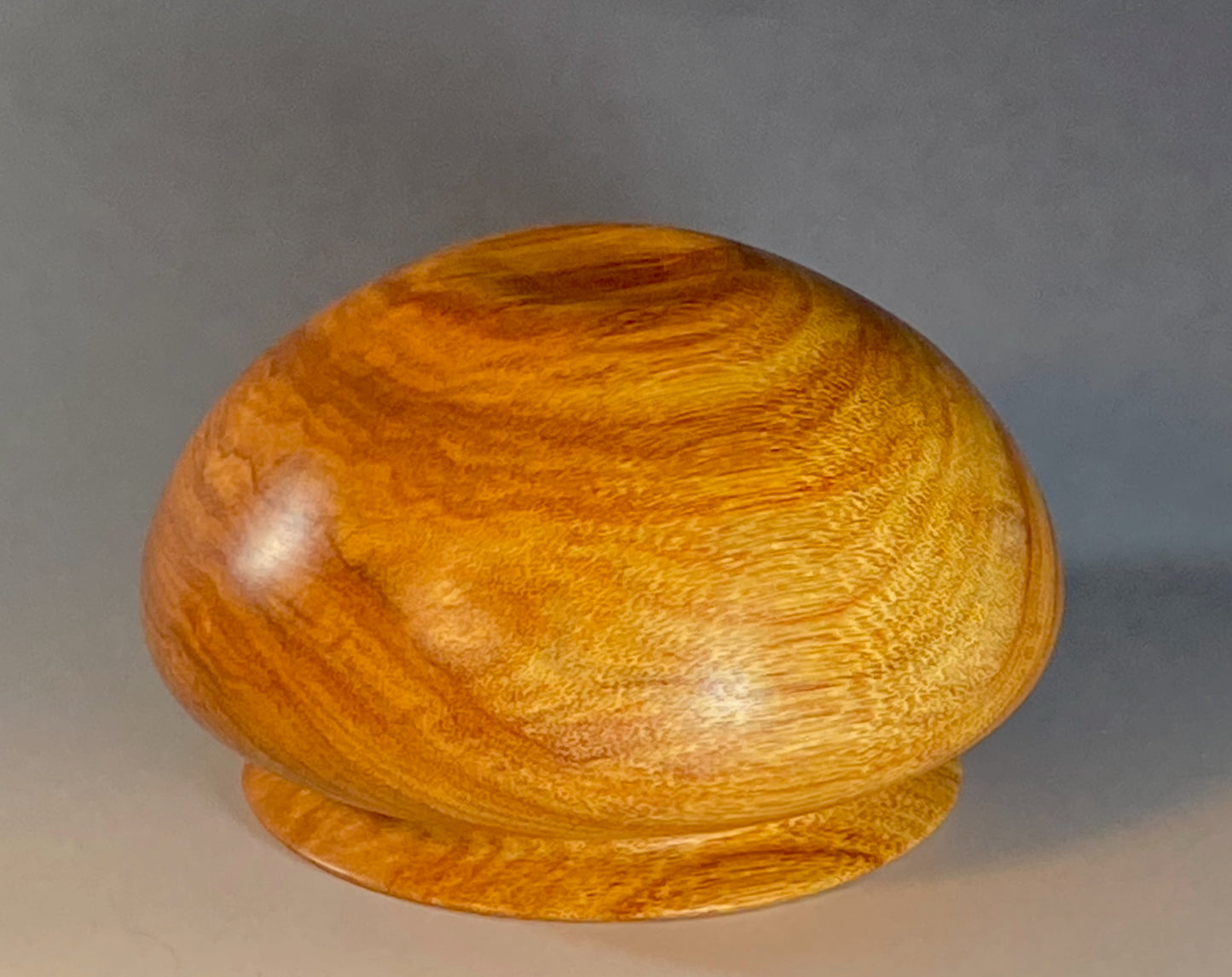ENCLOSED FORM TURNED FROM CANARYWOOD